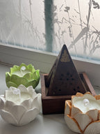 Vela de flor de loto.